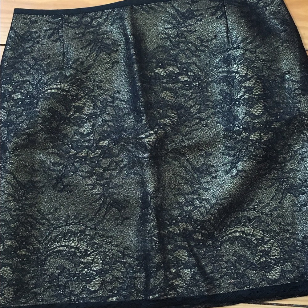Never worn. Tahari black lace skirt.